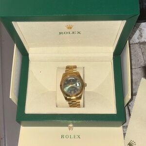 Rolex Gold Watch with Green Dial